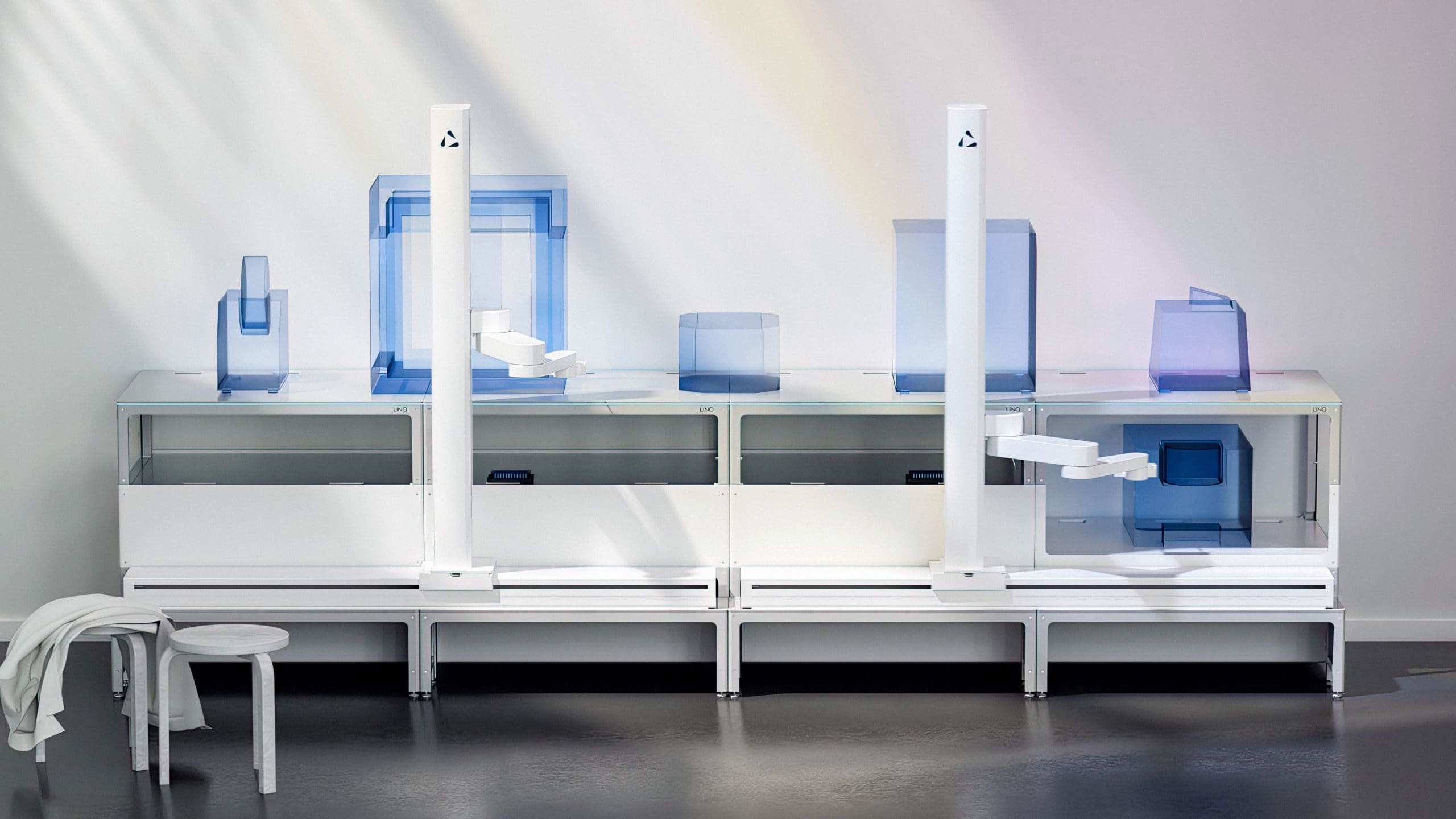 A render of 4 Automata LINQ benches and 2 robot arms in a laboratory.