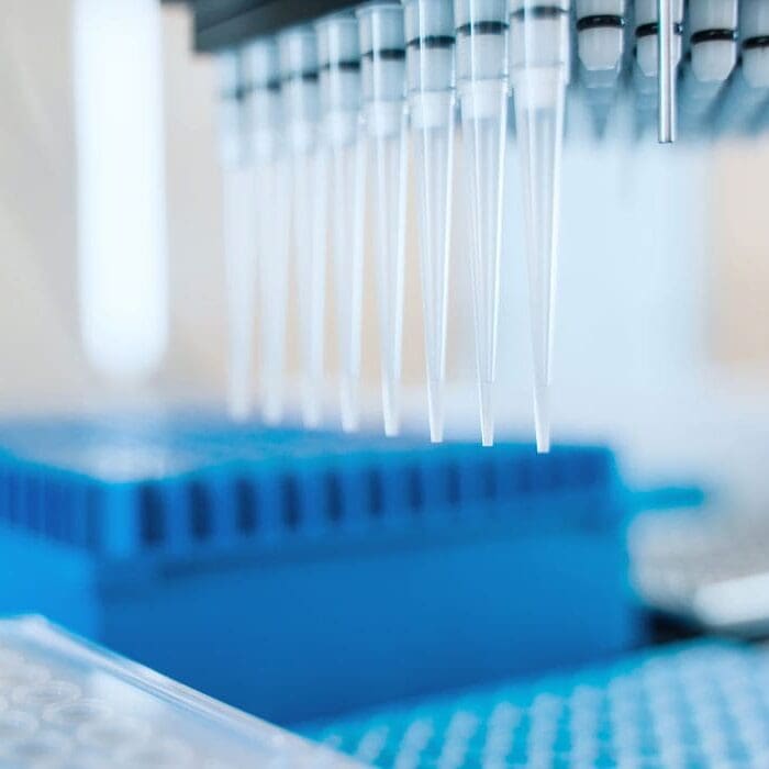 A stock image of a liquid handler during an automated ELISA workflow.